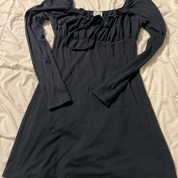 Dresses & Skirts - Black dress with ruffled details from Francesca’s brand blue raine.